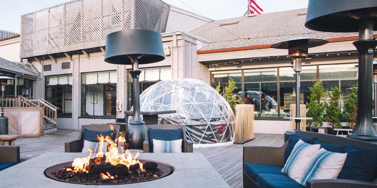 The Firepit at Gurney's Montauk with a dining igloo in the background