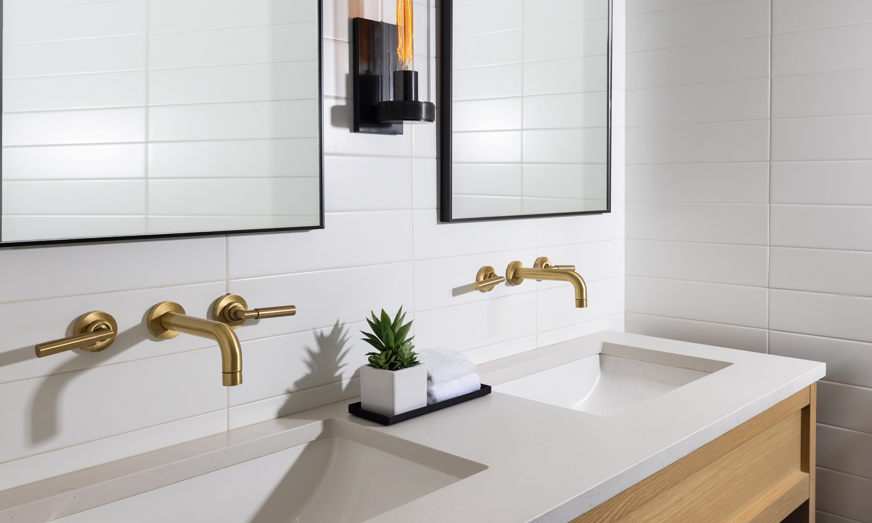 A bathroom in the Two Bedroom Partial Ocean View Suite at Gurney's Montauk Resort