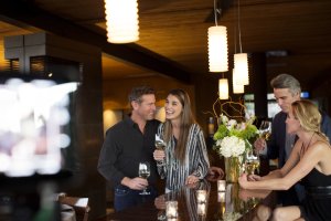 Couples sipping on wine in restaurant