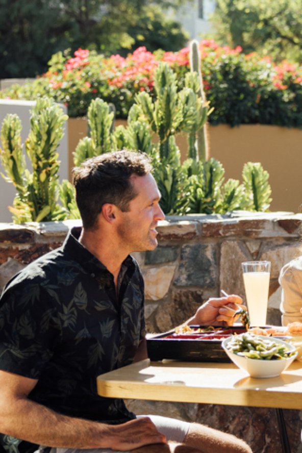 Friends enjoying weekend brunch on elements' Praying Monk Patio.