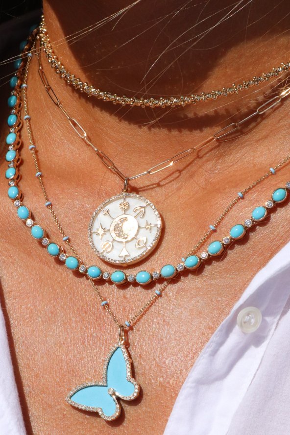 Hayley Style necklaces with teal gemstones.